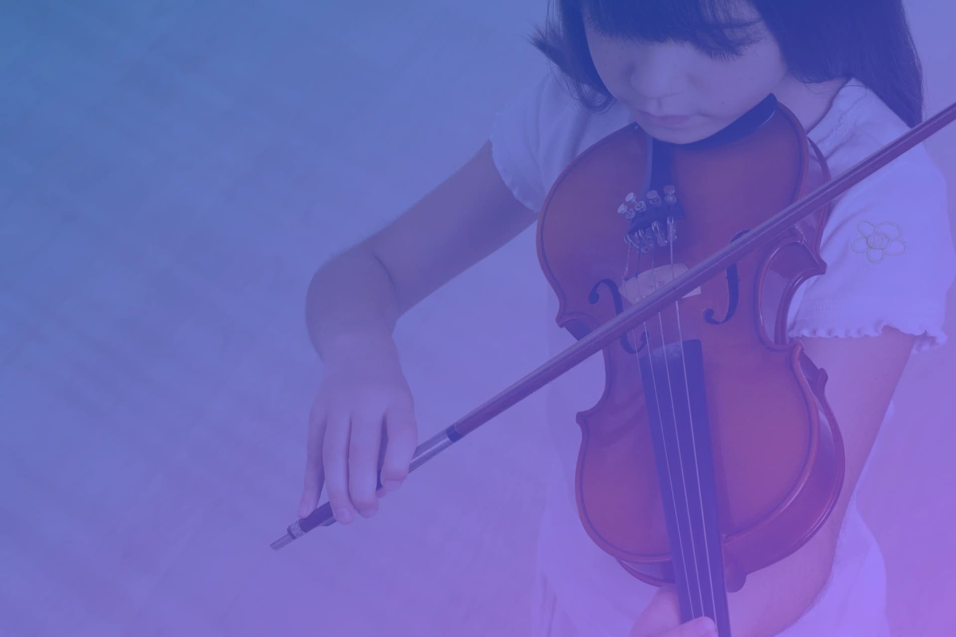 Young violinist practicing
